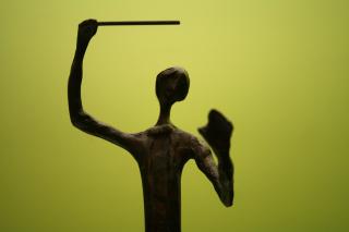 A sculpture of a conductor.